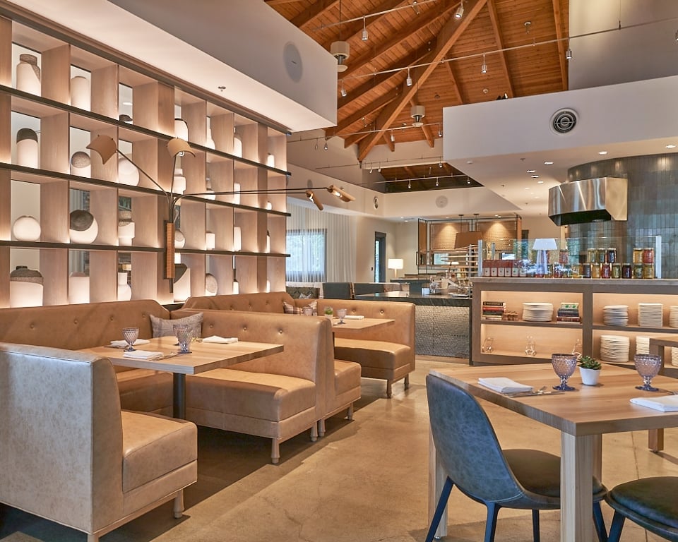 Indoor seating area with booths and tables at Wit & Wisdom in Sonoma.