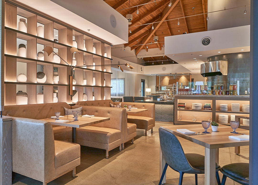 Indoor seating area with booths and tables at Wit & Wisdom in Sonoma.