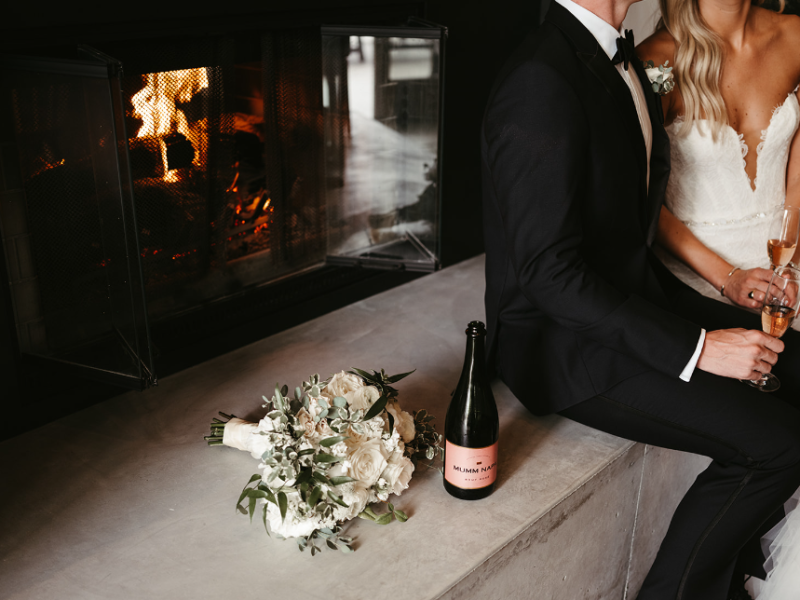 Married couple sitting with champagne