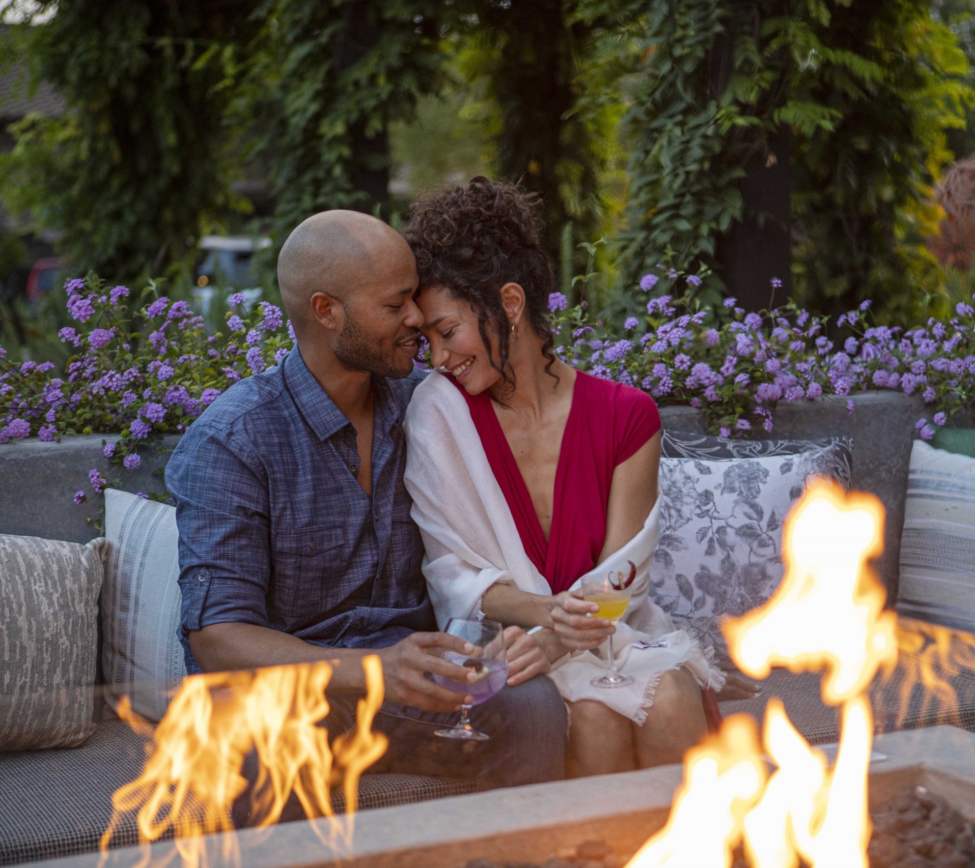Couple at the firepit at Wit & Wisdom