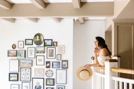 Guest at The Lodge at Sonoma and the lobby gallery wall