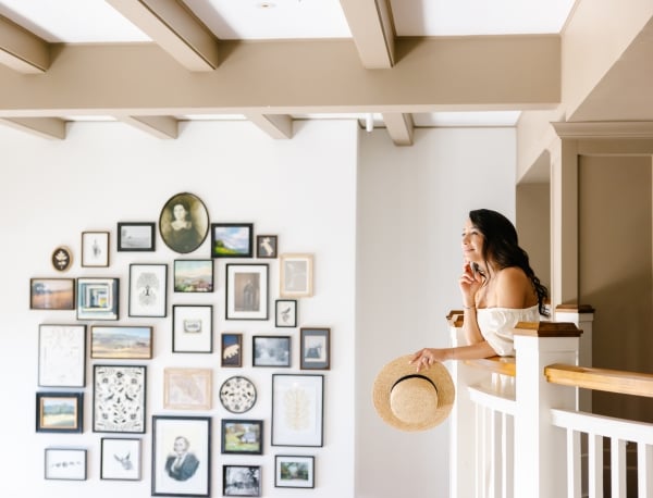 Guest at The Lodge at Sonoma and the lobby gallery wall
