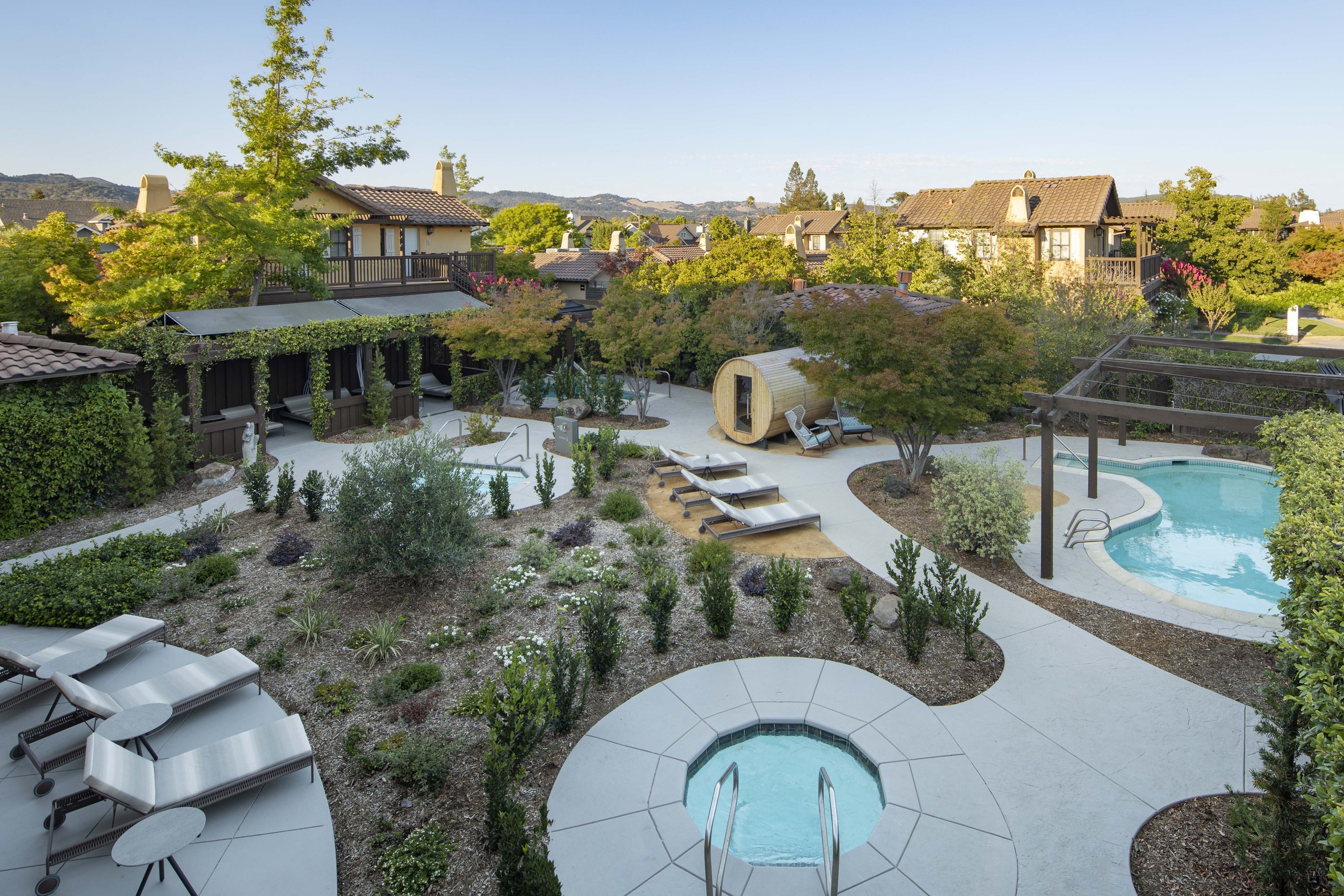 Aerial view of the spa garden, soaking pools, and cedar barrel sauna at The Lodge at Sonoma